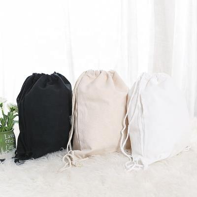 China Custom Resurable Handled Logo Printed Black Canvas Drawstring Bag String Gift Bag for sale