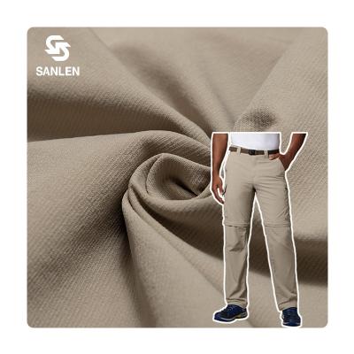 China Waterproof 320D 90 Nylon Spandex Man Sports 10 Increasing Pants Ripstop 4 Way Stretch Nylon Spandex Elastic Outdoor Fabric For Trousers for sale