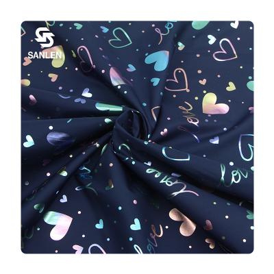 China Colorful Downproof 20D 50D Pongee Heart Custom Coated Embossed Printed 100% Polyester Digital Printing Outdoor Stretch Fabric For Jacket for sale