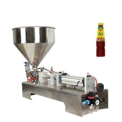 China Food SHANGHAI JD Semi Automatic Liquid Filling Machine Chili Sauce Filler Customized Nozzles Heads for sale