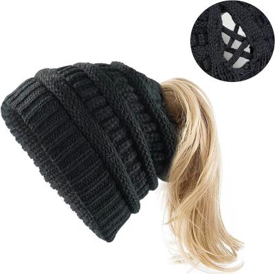 China YouYe BeanieTail COMMON High Quality Knitted Soft Stretch Cable Knit High Bun Ponytail Opening Beanie Hat for sale