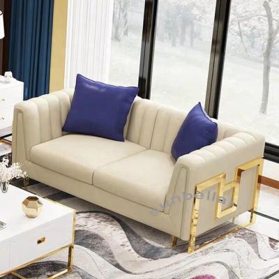 China New Design Modern European Style Luxury Sectional Sofa Wedding White Genuine Leather Gold Stainless Steel Sofa Set Sofa For Living Room for sale