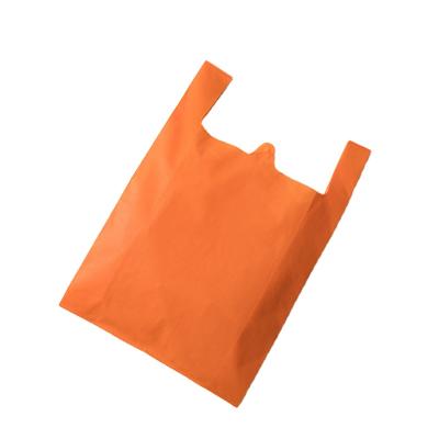 China Eco Friendly Biodegradable Recycled Non Woven Vest Carry Bag For Supermarket Carry Tote T-shirt Bag for sale