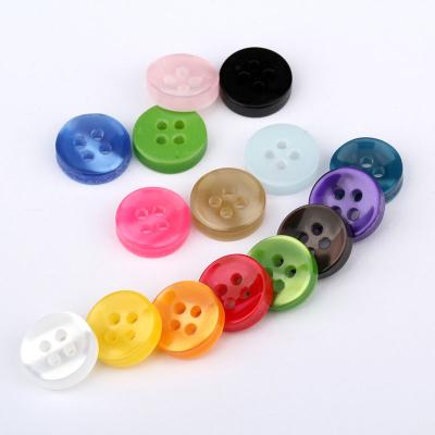 China Diy Sustainable Colored Transparent Eco - Friendly Round 4 Holes Shirt Resin Button for sale