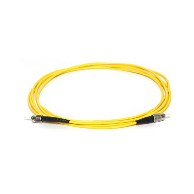 China Hot Sale 0.9mm 2mm 3mm SM Type FTTH MT-D1000 Simplex Fiber Optic Patch Cord FC-ST UPC Single Mode Fiber Optic Patch Cord for sale