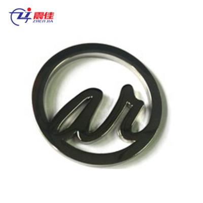 China Fasion 50mm Round Cavity Logo Custom Metal Plates Brand Logo For Leather Handbags for sale