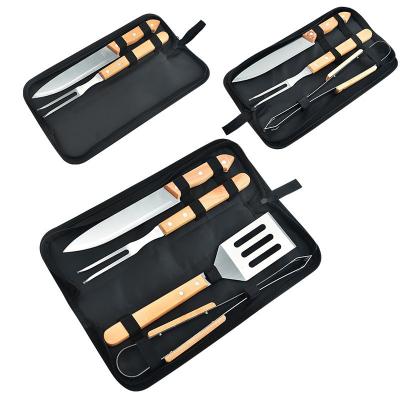 China Easily Cleaned Professional BBQ Accessories Multifunctional Stainless Steel BBQ Tool Set Portable Outdoor BBQ Tool Set with Wooden Handle for sale