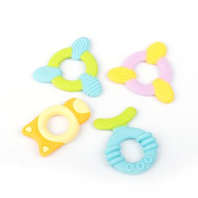 China New Food Grade Approval Soft Toy 100% Silicone Rainbow Baby Teether For Teething Infant for sale