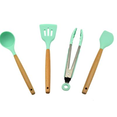 China Modern Kitchen Accessories Silicone Kitchenware Utensil Sets With Wooden Handle for sale