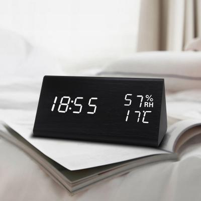 China Wholesale Creative Led Electronic Clock LUMINOVA Temperature and Humidity Multifunctional Mute Alarm Clock Wooden Student Gift for sale