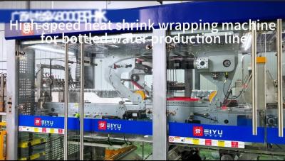 China High Speed Heat Shrink Film Packaging Machine For 48000BPH Bottled Water Production Line for sale