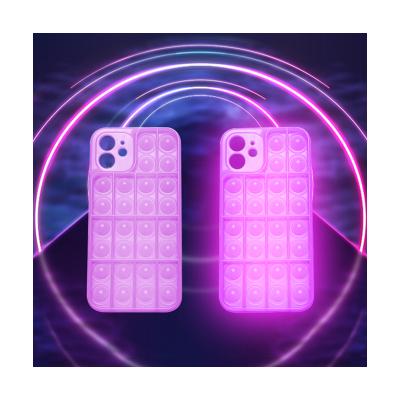 China 3d glow jumping person anti-fall fidgety person MEGA phone case popit phone case for sale