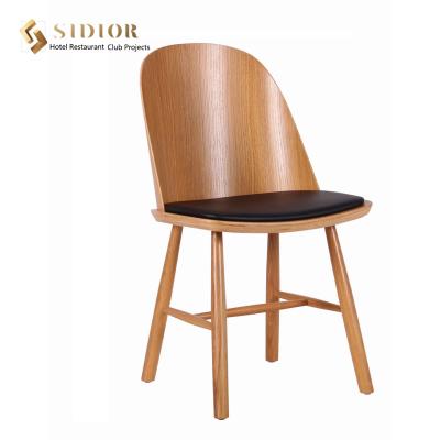 China La madera apilable tapizó la cena del ODM del OEM de las sillas ergonómicamente en venta