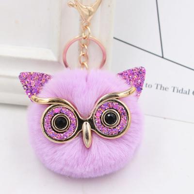 China Custom wholesale custom sequined head chained owl hair ball doll machine plush fur bag car pendant anime accessories big artificial hair eyes for sale