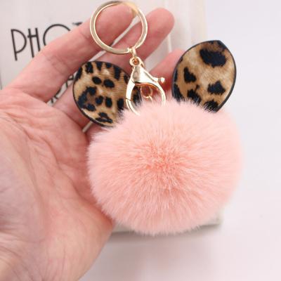 China Custom Cute Designer Anime Pendant Rex Rabbit Fur Leopard Print Fur Ear Hair Ball Rabbit Ear Bag Plush Toy Key Chain Accessories Gift for sale