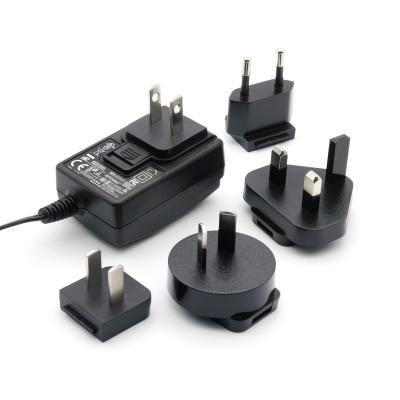 China DOE Power Adapter AC/DC 15V 0.4A 1A 1.2A 2A 2.7A Wall Mount Pin Interchangeable FCC RCM PSE CCC BSMI BSMI for sale