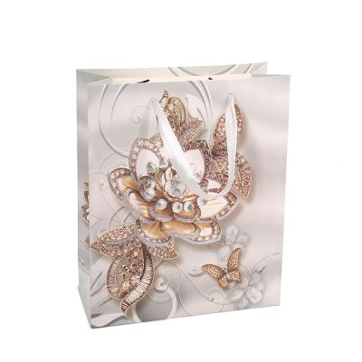 China Creative Style Tote Cardboard Gift Paper Bags Valentine's Day Special Wholesale Recyclable Border for sale