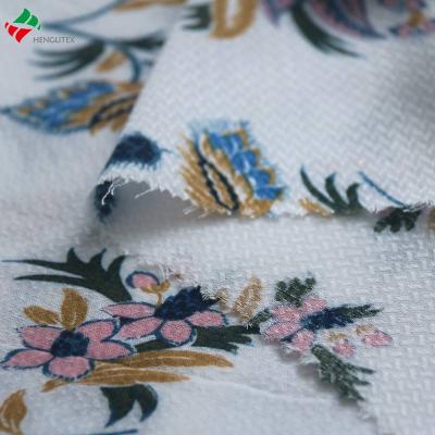 China Soft and comfortable rayon jacquard dress fabric 100%Viscose anti-static printed jacquard /dobby fabric for sale