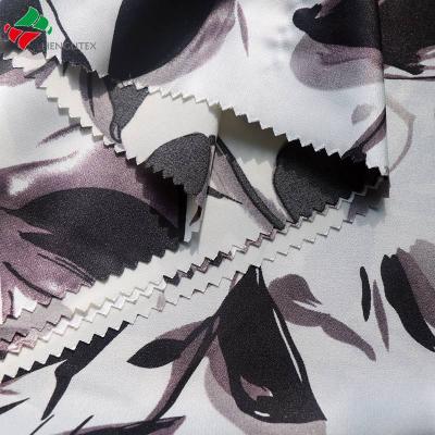 China Waterproof super soft feeling 100%polyester glazed twist satin fabric for dress garment for sale