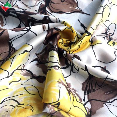 China Waterproof super soft feeling 100%polyester glazed twist satin fabric for dress garment for sale