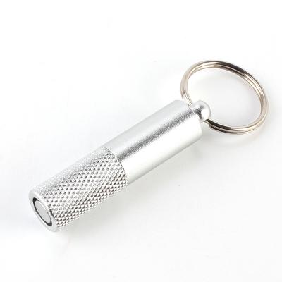 China Portable Multifunctional Stainless Steel Cigar Punch Cutter Cigar Puncher With Key Chain Attachment for sale