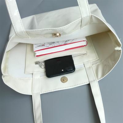 China Other White Glossy PVC Printed Handbag , Unique Handbags for sale