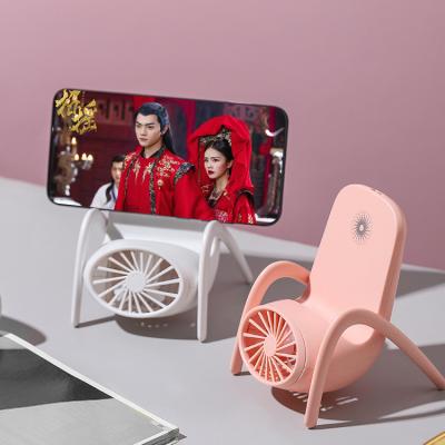 China 2021 Adjustable Mini Cute Plastic Desktop Phone Holder with LED Light Fan for Desktop Mobile Phone Holder Mini Fan Phone Accessories for sale