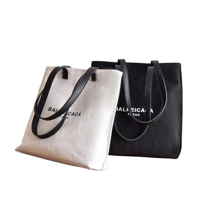 China Custom Made High Quality White Canvas Eco Friendly Tote Bag With Leather Bag Strap for sale