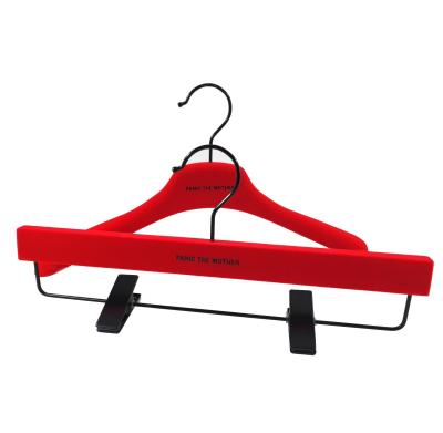 China Durable Customized Warm Red Velvet Plastic Hanger With Bespoke Logo for sale