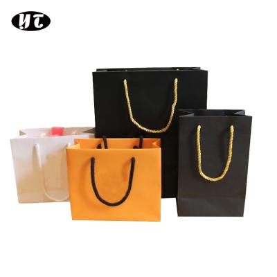 China Biodegradable Paper Handle Kraft Cardboard Shopping Paper Bags For Promotion And Gift for sale