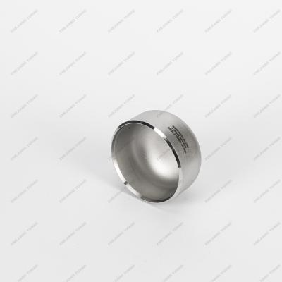 China 304L SS Butt Welded Cap Sand Rolling Stainless Steel Butt Welded Pipe Fittings for sale