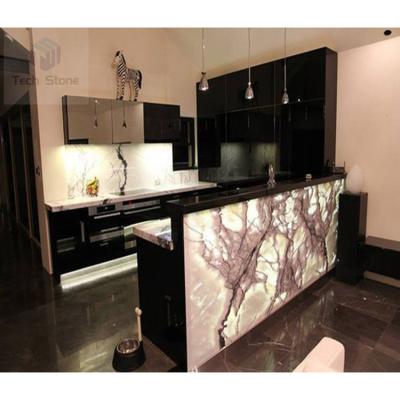 China Modern Design Warm Orange Organic Backlit Solid Surface Pattern Finish Led Bar Counter for sale