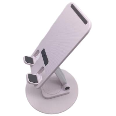 China Rotating Phone Holder 360 Desk Metal Bottom Phone Holder Cradle Stand Mobile Phone Desk Stand for sale