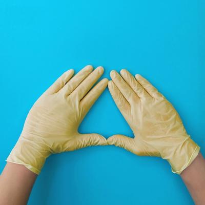 China Strong / Durable / Sensitive / Comfortable / Free Of Holes Disposable Gloves Malaysia Latex Powder Free for sale