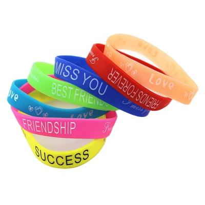 China China Wholesale Cheap Glow in the Dark Custom Engraving Logo Silicone Wristband for sale