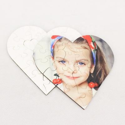 China Cartoon Toy Wholesale Custom 23 Pieces Heart Shape Glossy White Sublimation Blanks MDFJigsaw Puzzle for sale