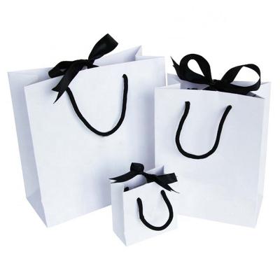 China Wholesale Custom Fashion Craft Gift Handmade Plain Paper Printed White Shopping Bag With Ribbon Handle for sale