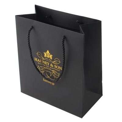 China New Handmade Luxury Boutique Rope Handle Hot Stamping Shopping Packaging Paper Bag Customized Matt Lamination Shopping Bag Black for sale