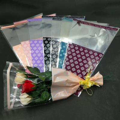 China 50 Single Rose Packaging Bags Flower Sleeve Paper Reusable Reusable Packaging Clear Paper Bag For Bouquets OEM ODM Floscular Cellophane Bag for sale