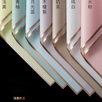 China Wholesale PVC Waterproof High Quality Soft and Elegant Flower Gold Bouquet Flower Side Wrapping Paper Flower Side Wrapping Paper for sale