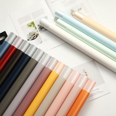 China Soft And Elegant Korean Two-tone Waterproof Plastic Fabric Flower Vintage Floral Bouquet Manual Paper Gift Wrapping Wrapping Paper for sale