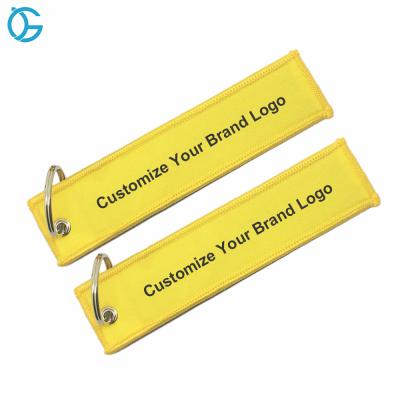 China Clothing Wholesale Brand Design Logo Fabric Embroidery Woven Keychains Woven Manufacturing Design for sale