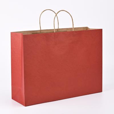 China Recycled Materials Luxury Custom Size Package Paper Handle Paper Bag Kraft Paper Shopping Bag for sale