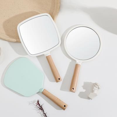 China Custom Logo Espejo Magnifying Portable Bamboo Cosmetic Hand Around Vanity Mirror Mini Pocket Make Up Makeup Mirrors for sale