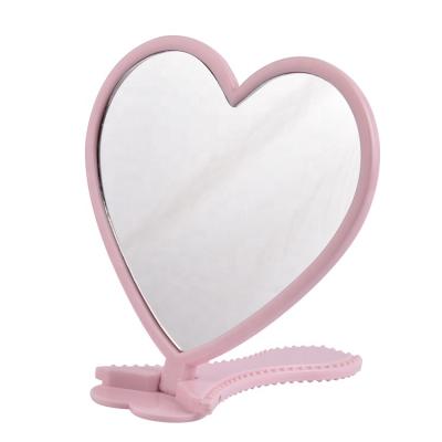 China Personalized Goddess Used One Side Heart Shape Plastic Hand Mirror Personalized Cosmetic Makeup Hand Held Mirror for sale