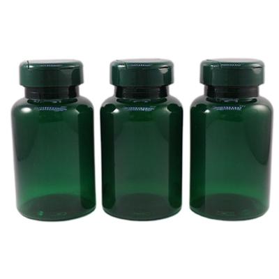 China Cylindrical PET Capsule Packing Round Food Dietary Supplement Packing Green Plastic Bottle for sale