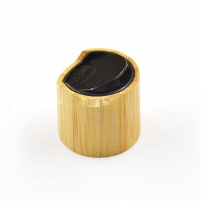 China Non Puddle 24/410 Wood Grain Bamboo Press Cap Cover Cosmetic Bottle Plastic Disc Shampoo Top Caps for sale