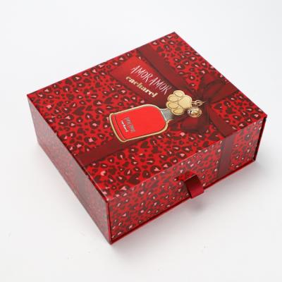 China Recycled Materials Custom Red Christmas Perfume Packaging Sliding Rigid Drawer Box With Insert for sale