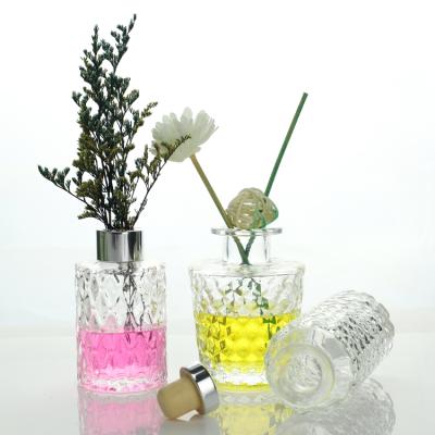 China OEM Style Custom Round Diffuser Glass Bottle With Rubber Stopper Unique Design Clear Essential Oil Bottle For Home Decor for sale