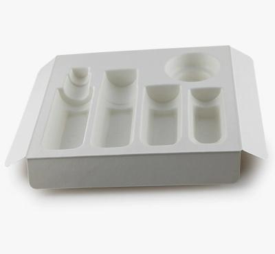 China Custom Pulp Molded Biodegradable Sugar Cane Bagasse Tray Cosmetic Packaging Paper Pulp Tray For Products for sale